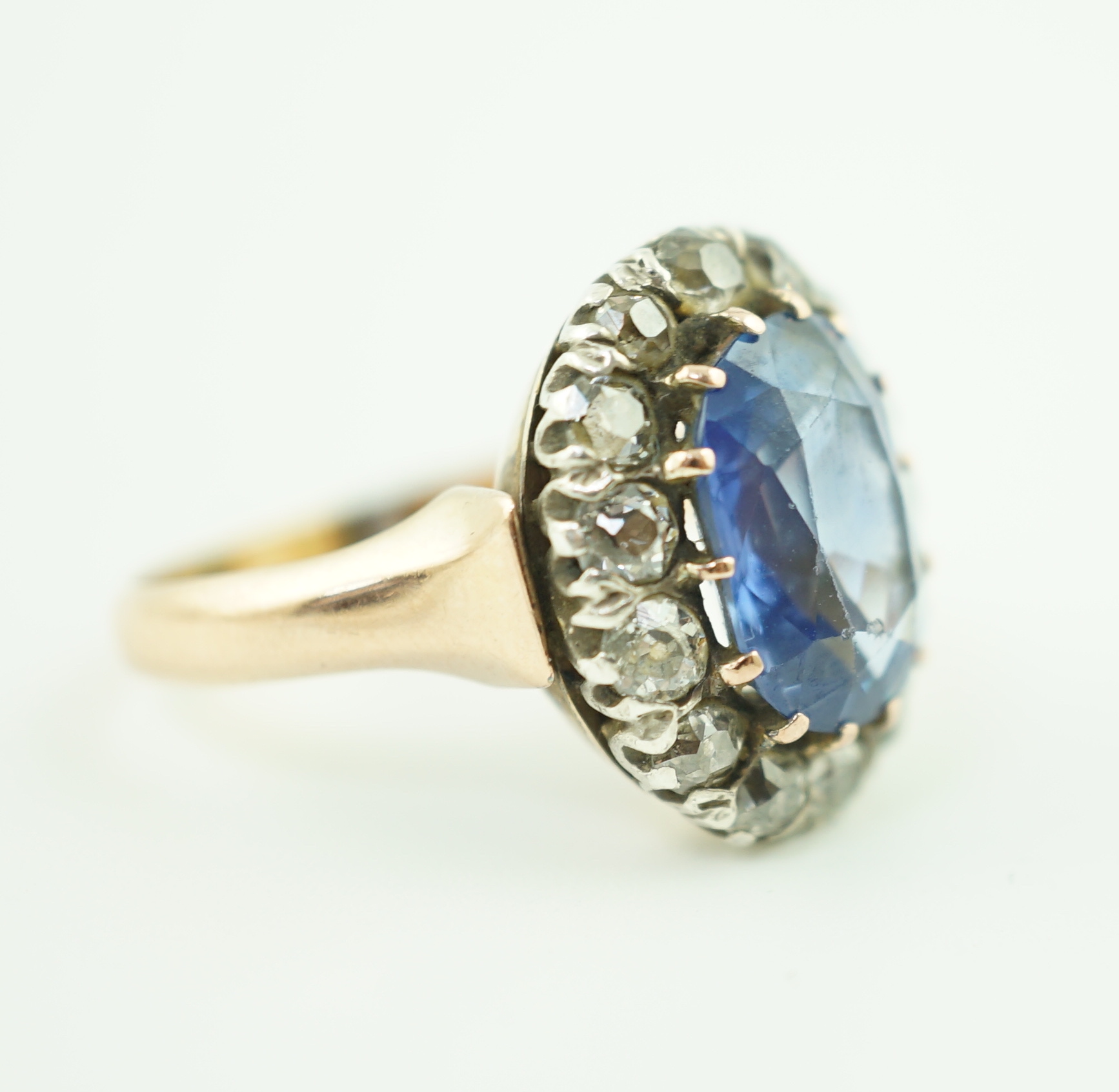 A Victorian gold, sapphire and diamond set oval cluster ring